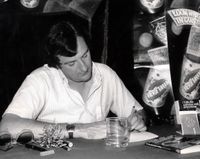 [Douglas Adams signing The Hitch-Hiker's Guide To The Galaxy: Life, the Universe and Everything (Product Image)]
