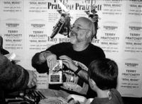 [Terry Pratchett signing Soul Music (Product Image)]