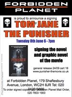 [Tom Jane signing The Punisher (Product Image)]