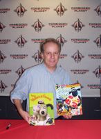 [Nick Park signing Fleeced! The New Wallace & Gromit Board Game (Product Image)]