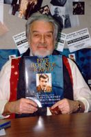[Nicholas Courtney signing Five Rounds Rapid! (Product Image)]